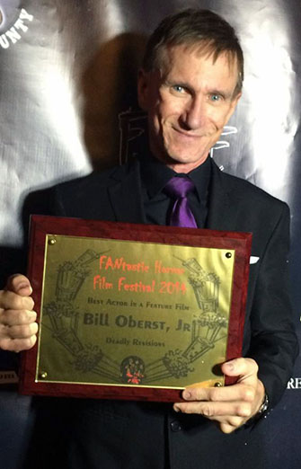 Bill Oberst, Jr with his Best Actor award for Deadly Revisions
